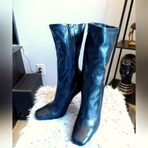 Size 6 Zip up Boots with 4" heels from Shoedazzle